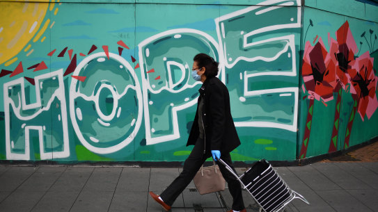 A shopper makes her once-a-day journey to Liverpool mall early on Saturday.