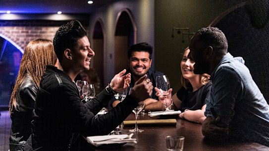 Strangers meet for a SocialTable dinner at Platform 818 in Sydney in May.