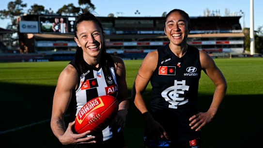 Inaugural AFLW players Darcy Vescio alongside Collingwood’s Brit Bonnici.