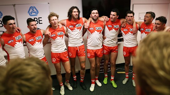 The Swans celebrate their remarkable win over Collingwood.