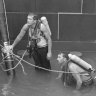 Why these two firemen dived back into a city fountain to rescue a boy