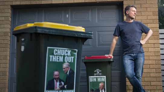 Acceptable? Hornsby Council has warned Asquith resident Peter Rickwood he cannot affix these signs to their bins.