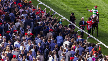 Spectators packed into Moonee Valley for last year's Cox Plate. Martin Pakula has urged the club to put forward a plan for crowds at the All-Star Mile.