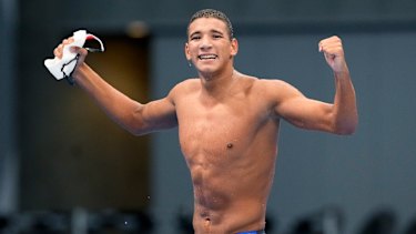 Ahmed Hafnaoui, of Tunisia, reacts after winning the 400m freestyle. 