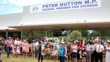 Supporters of the family rally outside Peter Dutton's electorate office in January.