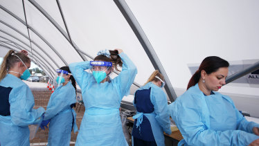 Nurses prepare to conduct COVID-19 tests at Bondi Beach testing clinic in Sydney. 