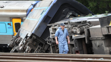 Police inspectors at the scene of the crash.