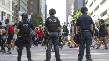 People join George Floyd's family in a march from Discovery Green to City Hall.