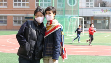 Hong Jung-hee, 47, artist, with her 21-year-old daughter at a polling station near Yoon’s residence