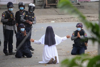 Sister Ann Rose Nu Tawng pleads with police not to harm protesters in Myitkyina in Myanmar’s Kachin state, amid a crackdown on demonstrations against the military coup. 