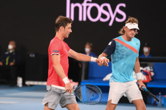 Matt Ebden and Max Purcell in action.