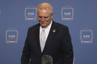 ‘It’s not true’: Morrison is grilled just 20 minutes after Macron’s explosive remarks in Rome. 