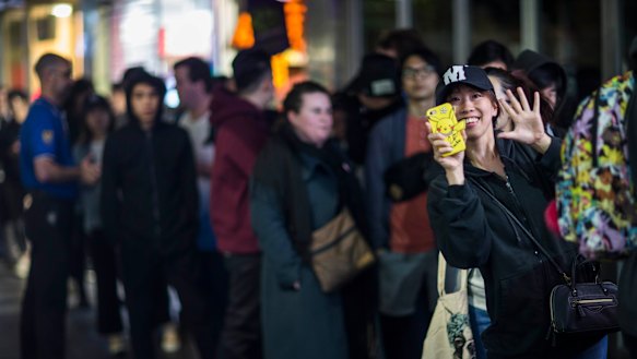 Fans line up for the midnight release of a new Pokemon game in 2018.