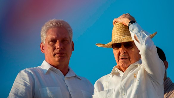 Cuba's First Vice President Miguel Diaz-Canel, left, stands with President Raul Castro  in 2016.