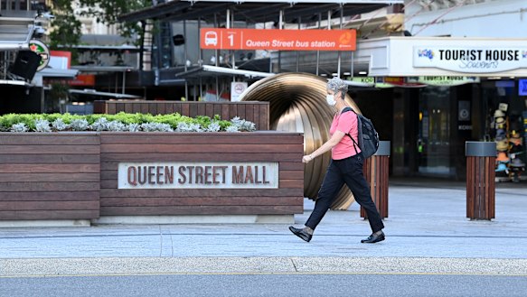 People wear face masks in Queen Street Mall in the Brisbane CBD after Premier Annastacia Palaszczuk announced a three-day lockdown for Brisbane.