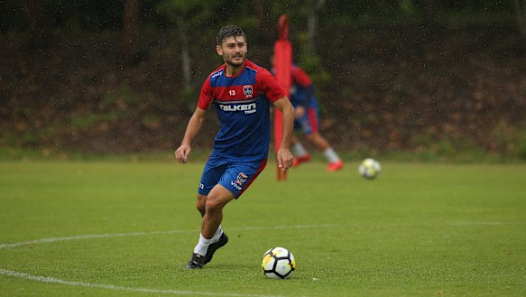 Moment of pride: Newcastle defender Ivan Vujica.