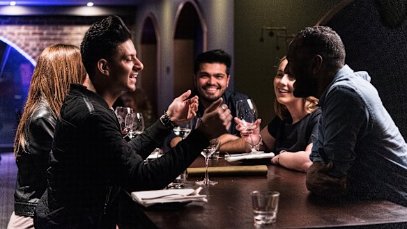 Strangers meet for a SocialTable dinner at Platform 818 in Sydney in May.