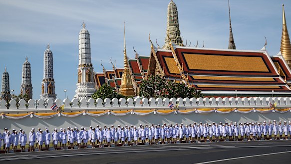 Thai officers stand outside the Grand Palace in Bagkok ahead of King Maha Vajiralongkorn's coronation.