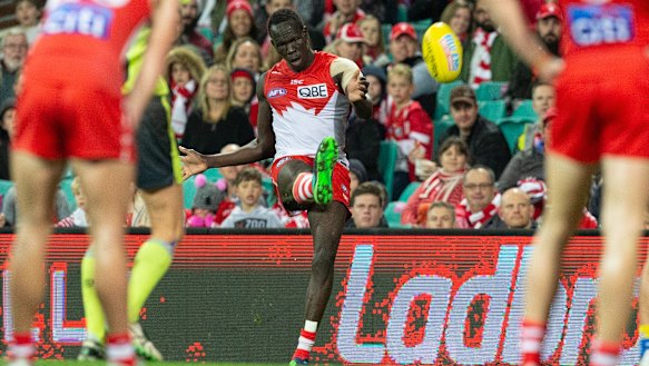 Aliir Aliir has been in career-best form at the back for Sydney this year but is happy to share the team's rucking duties with Sam Reid for the next few weeks.