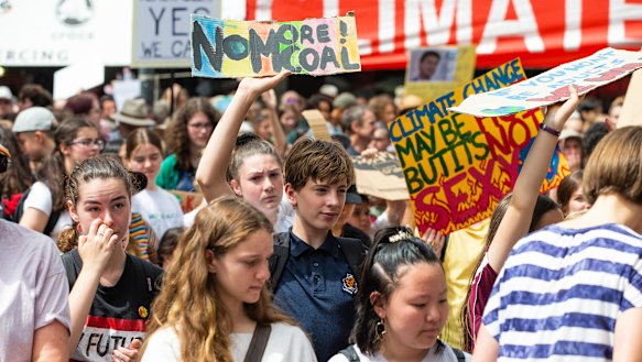 Canberra school students strike from school to protest Adani's coal mine and government inaction on climate change .