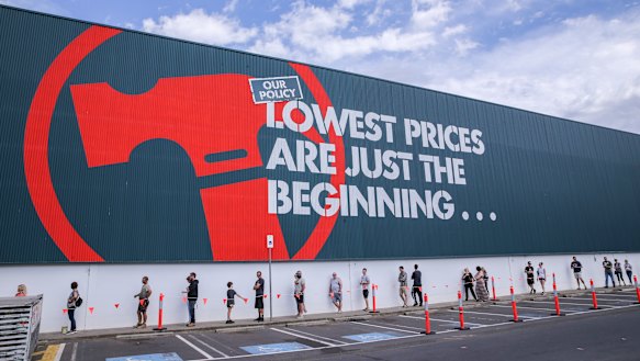 People social distancing as they queue to enter the Bunnings Warehouse in Croydon on Sunday. 