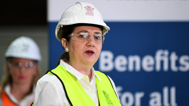 Queensland Premier Annastacia Palaszczuk donned a hard hat on Thursday to spruik her government's credentials on jobs in the face of massive virus-related unemployment