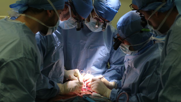 Surgeons perform the second face transplant on Jerome Hamon. 