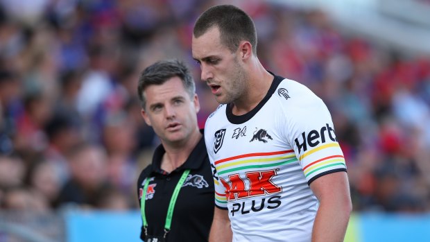 Concern: Penrith's Isaah Yeo leaves the field during the match against Newcastle last Saturday.