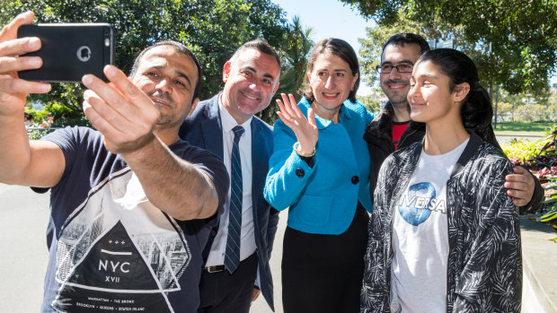Premier Gladys Berejiklian and Deputy Premier John Barilaro with members of the public on Sunday after announcing the new ministry.