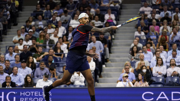 Kyrgios hits a forehand. 