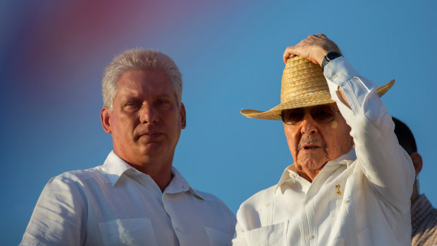 Cuba's First Vice President Miguel Diaz-Canel, left, stands with President Raul Castro  in 2016.