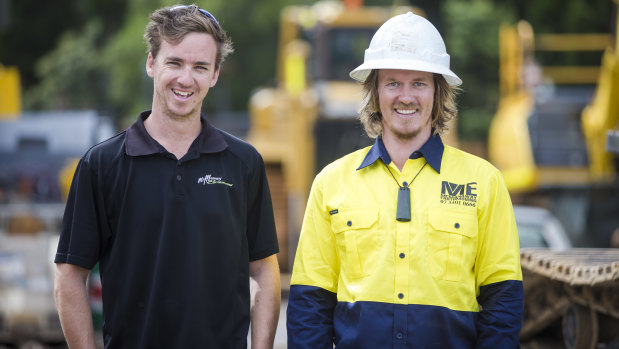 Former brickie Ben Roche (left, pictured with boss James McManaway) is recovering from a serious brain injury and is now driving trucks.