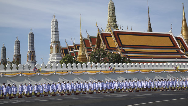 Thai officers stand outside the Grand Palace in Bagkok ahead of King Maha Vajiralongkorn's coronation.