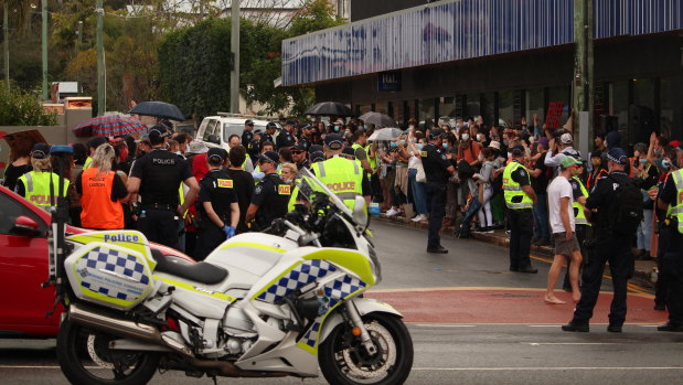 Michael Berkman raised concerns police "had forced peaceful protesters into confined spaces".