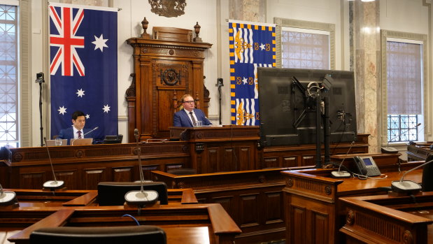 Brisbane City Council chairman Andrew Wines chairs a livestreamed council meeting with councillors logging in from home and offices.