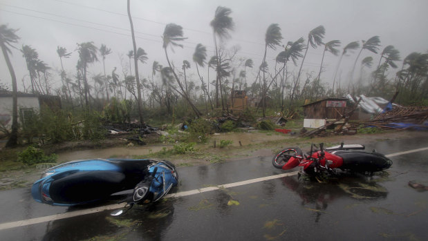 Motorcycles lie on a street in Puri, Odisha state, India, after Cyclone Fani made landfall on Friday.