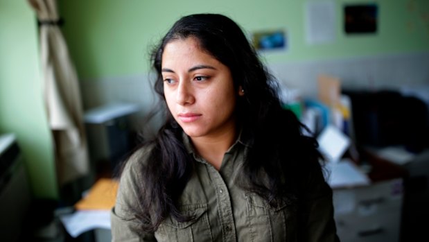 Maudy Constanza, 24, of Guatemala, and her two young daughters are in Ashland, Massachusetts, while her husband and son were sent to Nuevo Laredo, a Mexican border town, under the Trump administration's Remain in Mexico policy. 