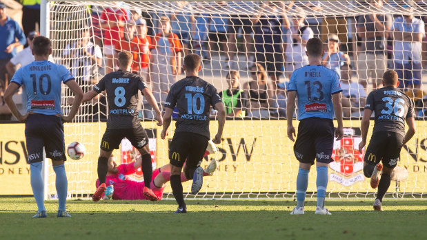 Impregnable: Andrew Redmayne saves a penalty from Riley McGree at Jubilee Oval.