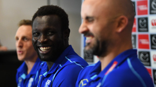 Daw shares a laugh with caretaker coach Rhyce Shaw (right) and Alex Moore.