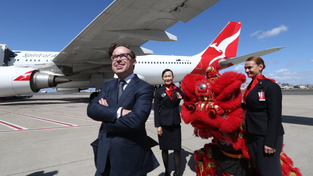 Qantas boss Alan Joyce has defended the airline's decision to remove references to Taiwan as a separate country.