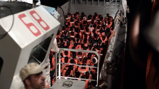 Migrants about to board the SOS Mediterranee's Aquarius ship and MSF (Doctors Without Borders) in the Mediterranean Sea. 