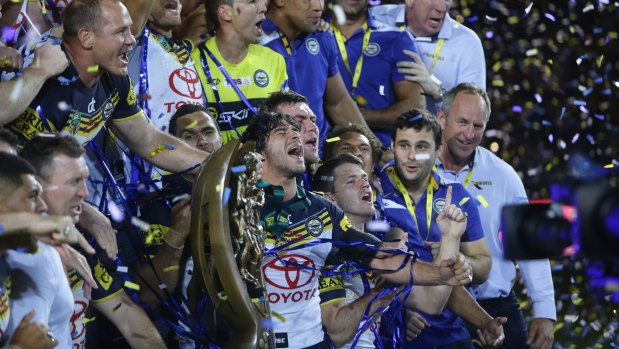 Champions: Thurston and the Cowboys celebrate their 2015 grand final win.