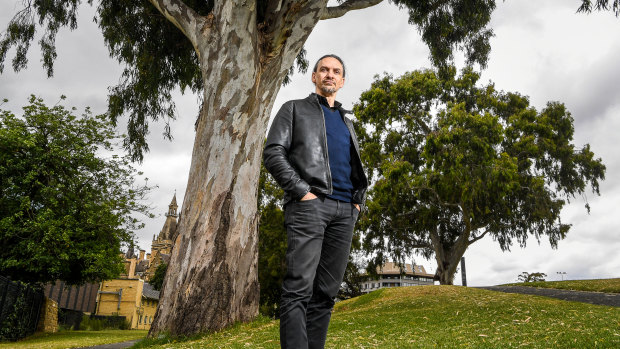 Indigenous architect Jefa Greenaway by the ancient river red gums at the University of Melbourne. Before European contact, it was a place of streams and billabongs. 