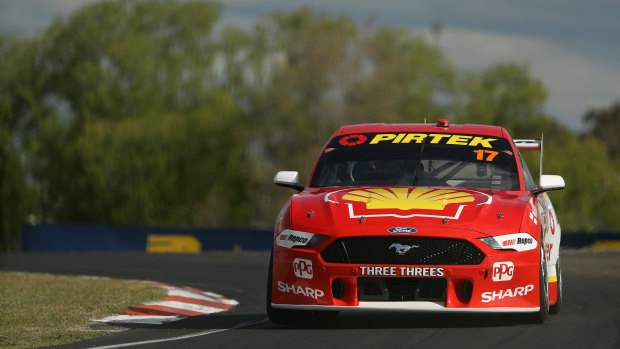 Track-record holder Scott McLaughlin pilots his Ford around Mount Panorama in practice on Thursday.