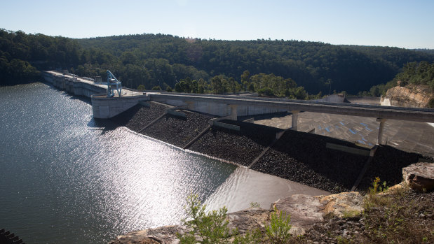 Warragamba Dam at almost 98 per cent full in June 2016. The government wants to lift the wall by 14 metres to add flood mitigation to the dam's role.