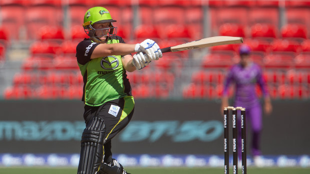 Opening blast: Rachel Priest crashes a ball to the boundary.
