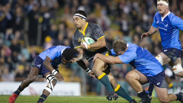 Front-running: Tetera Faulkner of Cheika's Choice is tackled at Leichhardt Oval.