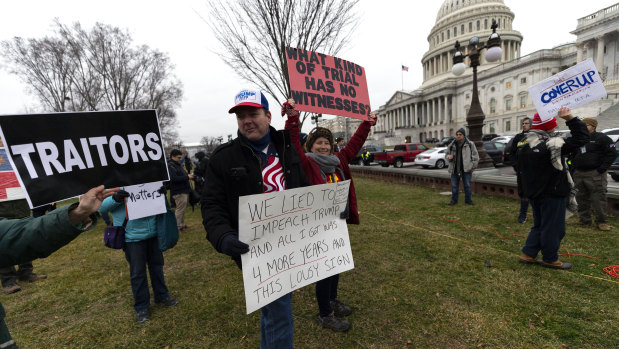 Activists gather at the Capitol after the impeachment acquittal of US President Donald Trump.