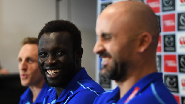 Daw shares a laugh with caretaker coach Rhyce Shaw (right) and Alex Moore.