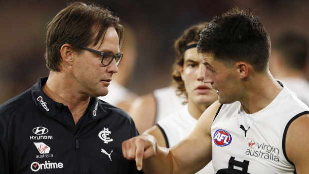 Blues coach David Teague speaks with Nic Newman during their side’s clash with the Demons.